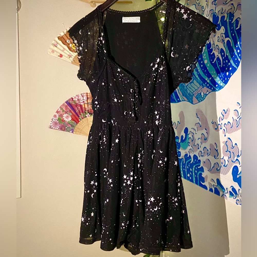 This romper is OUT OF THIS WORLD 💫
